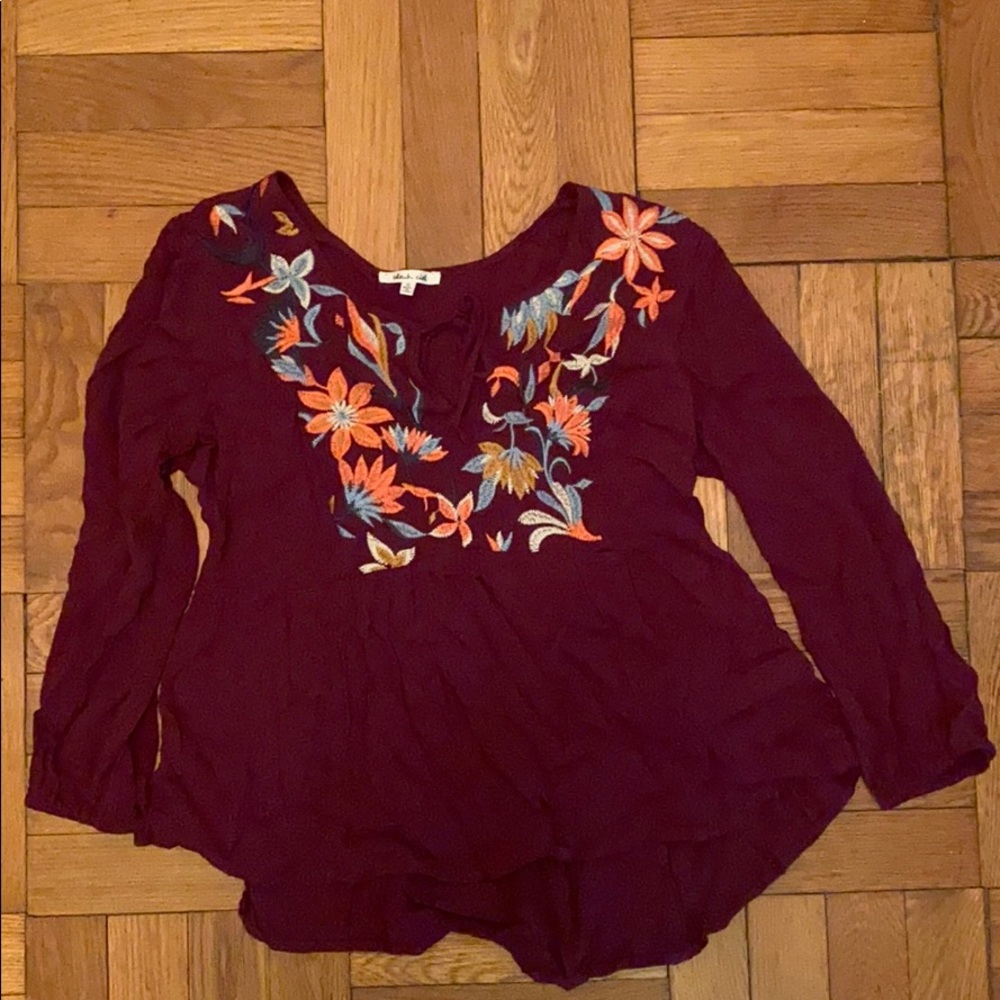Cute floral peplum long sleeve top